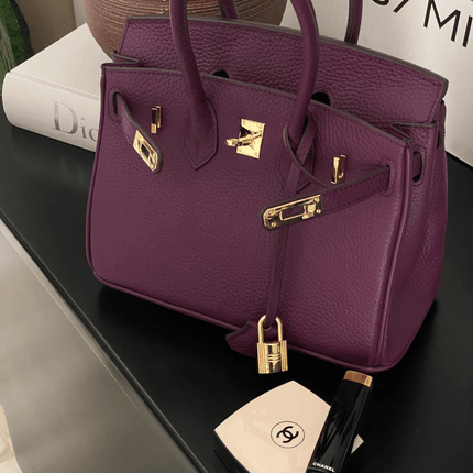 Iconic Vegan Leather Handbag – Timeless Design with Gold Accents