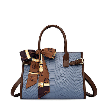 Chic Beige Handbag with Scarf Detail – Luxury Snake Texture